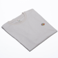 Oatmeal organic cotton unisex t-shirt with embroidered HIGGS dog logo on the chest.