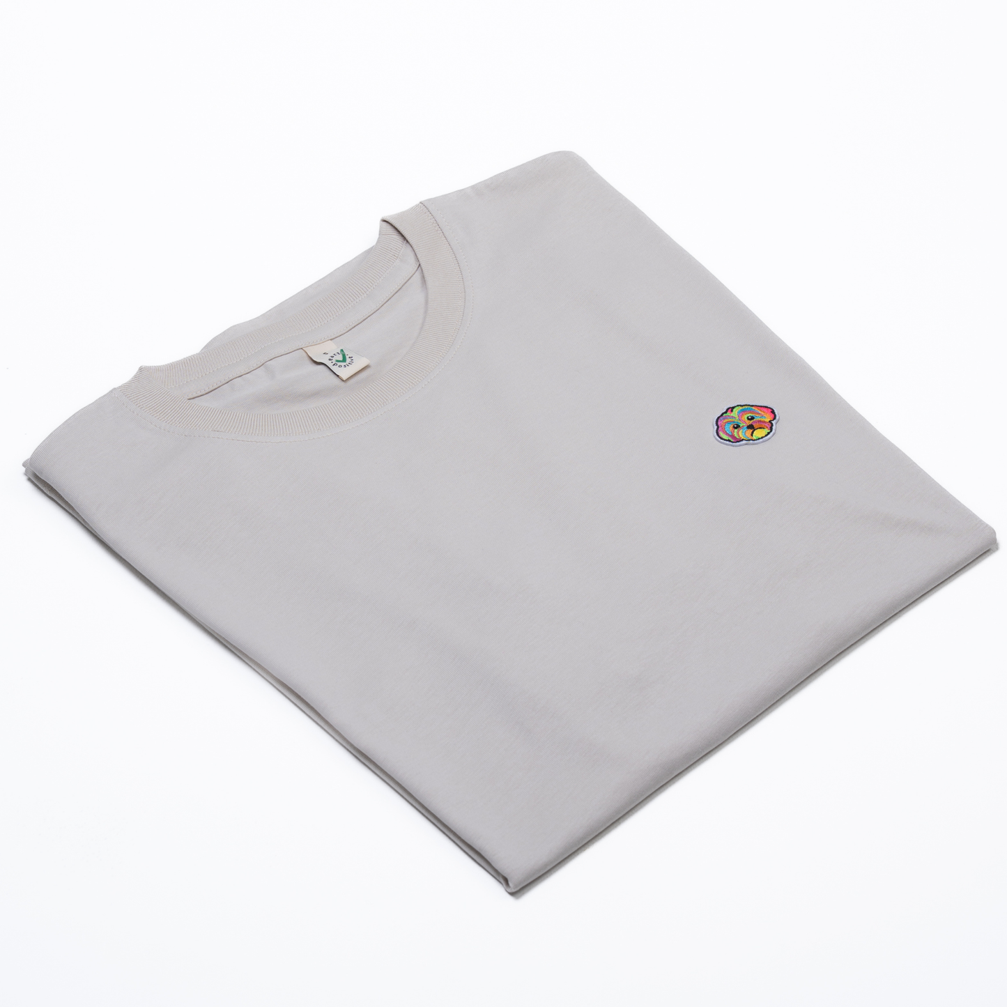 Oatmeal organic cotton unisex t-shirt with embroidered HIGGS dog logo on the chest.