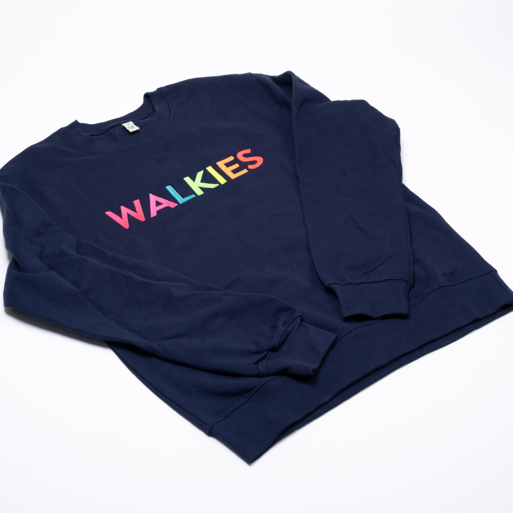 Navy blue sweatshirt with 'WALKIES' in colorful letters on a white background