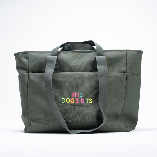 The Dog’s Bits recycled dog travel tote bag with multiple pockets and dual carry handles for holidays and weekends away.